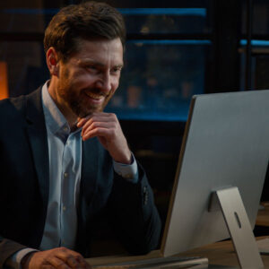 Happy Man watching a video on a website